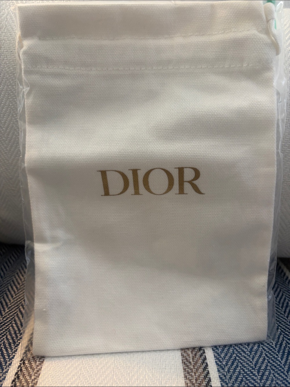 Dior Cream Drawstring Pouch with Gold Logo
